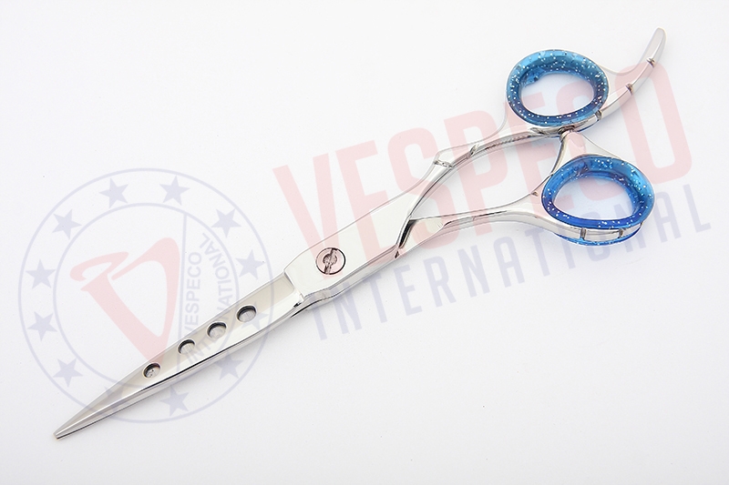 Scissors with holes